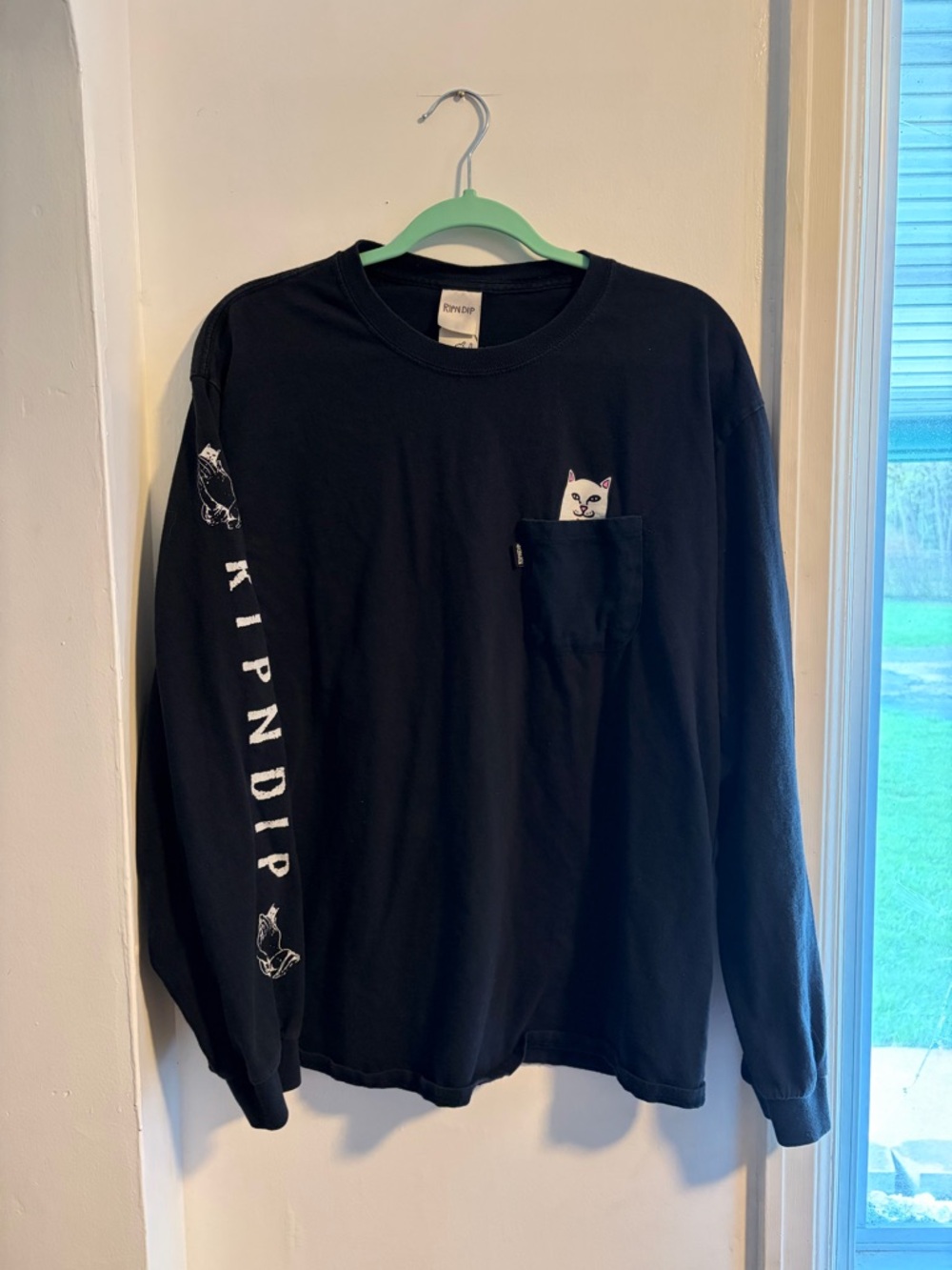 Ripndip Black Long Sleeve Pocket Tee with Peek-A-Boo Cat Graphic